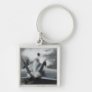 Chaveiro Um diretor de cabina de voo sinaliza F/A-18F