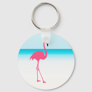 Chaveiro Um flamingo rosa giro na praia