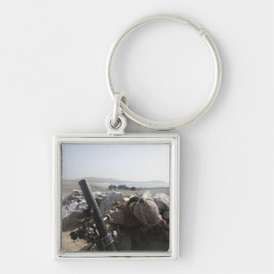 Chaveiro Um fuzileiro naval dos E.U. ateia fogo a um