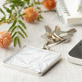 Chaveiro um quadro preto com fundo branco com linhas