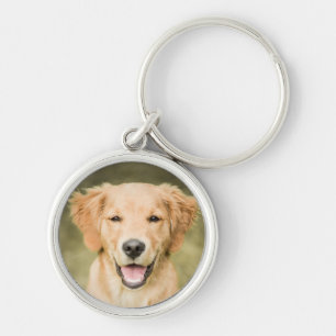 Chaveiro Um retrato de um filhote de cachorro do golden