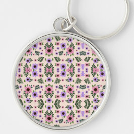 Chaveiro Uma pulseira de chave redonda com um floral vibran