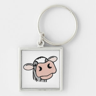 Chaveiro vaca de desenho animado preto branco rosa beijo ci