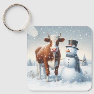 Chaveiro Vaca fofa & boneco de neve no campo de inverno