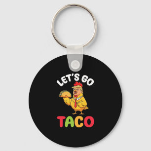 Chaveiro Vamos Lá Taco Trump Personagem de Frango Segurando
