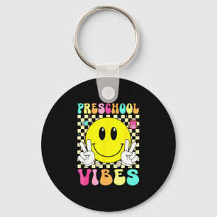 Chaveiro Vibrações de pré-escola rosto sorriso retrô de vol