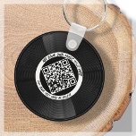 Chaveiro Vinil | Musical DJ | Código QR<br><div class="desc">Apresentando nosso chaveiro de código QR do estilo VL personalizável - o acessório perfeito para o profissional de música! Este chaveiro apresenta um elegante registro de LP vinil em preto e branco, juntamente com um código QR que pode ser ligado à sua própria música. Com nosso recurso de "personalização", você...</div>