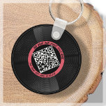 Chaveiro Vinil | Musical DJ | Código QR<br><div class="desc">Apresentando nosso chaveiro de código QR do estilo VL personalizável - o acessório perfeito para o profissional de música! Este chaveiro apresenta um elegante registro de LP vinil em preto e vermelho, juntamente com um código QR que pode ser ligado à sua própria música. Com nosso recurso de "personalização", você...</div>