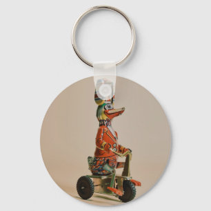 Chaveiro Vintage Antique Toy Duck em Bike