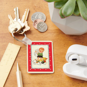 Chaveiro Vintage Boy segurando um gatinho com tortas corren