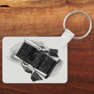 Chaveiro Vintage Business, mãos com projetos de arquitetura