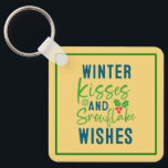 Chaveiro Winter Kisses And Snowflake Wishes-51963<br><div class="desc">Cozy winter quote design featuring “Winter Kisses And Snowflake Wishes.” Perfect for holiday gifts,  Christmas outfits,  and seasonal winter apparel. (Design code-51963).</div>