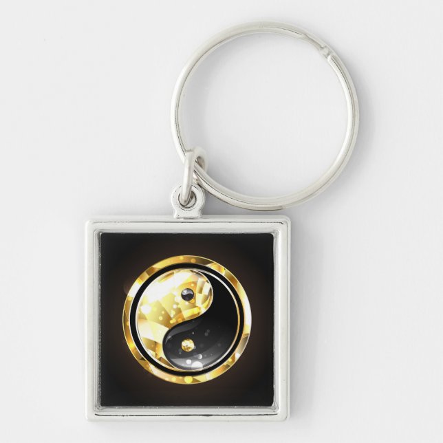 Chaveiro Yin Yang dourado em preto (Frente)