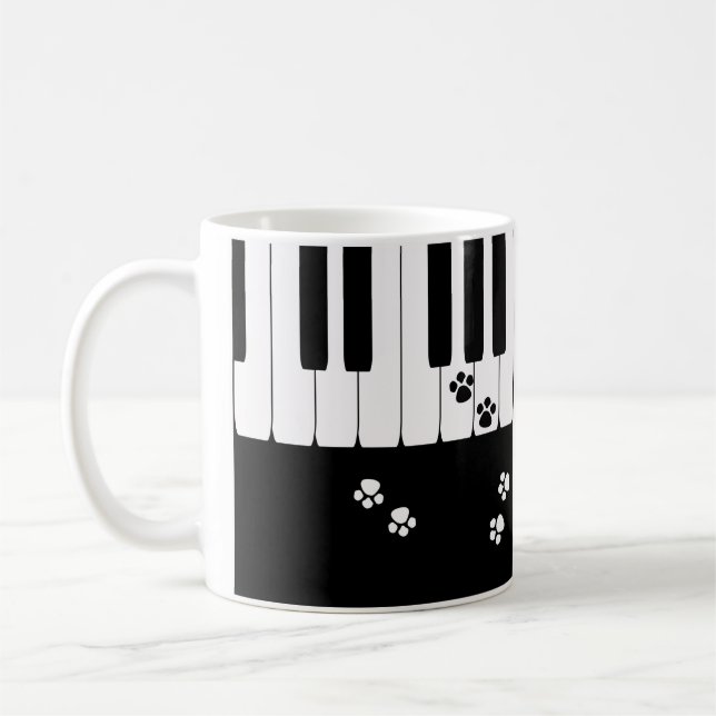 Chaves de piano e patas de gato, caneca de café (Esquerda)