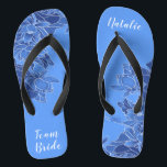 Chinelos Equipe Personalizada Favorita Blue Lotus Floral<br><div class="desc">Apresentando uma ilustração elaborada do padrão floral do Lotus azul, estes chinelos elegantes e antigos são um presente memorável para membros festas de casamento: noiva, damas de honra, mãe/tia da noiva, madrinha de casamento... Eles adicionarão uma dose de na moda de brilho ao seu dia de casamento, festa de solteira...</div>