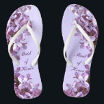 Chinelos Floral Lilac Flowers Madrinha de casamento de Casa<br><div class="desc">Lilases são o tema desses elegantes chinelos de casamento de Madrinhas de casamento florais com flores lilás rosa e mauve em fundo roxo. O texto pode ser personalizado para sua ocasião especial.</div>