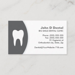 cinzas escuras e cartão de visita de dentista bra