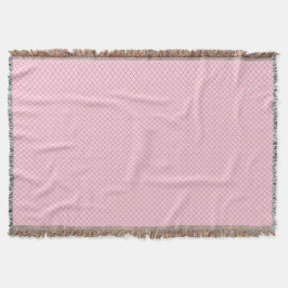 Cobertor A decorative pink throw blanket with a subtle 