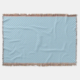 Cobertor A light blue blanket with a subtle diamond pattern