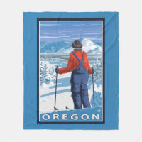 Esquiador que admira o poster das viagens vintage