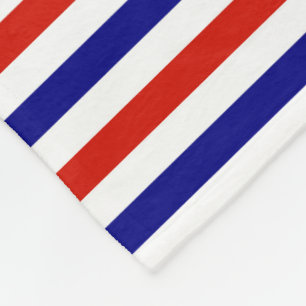 Cobertor De Velo Fleece Vermelho Branco e Azul Jogado em Aberto