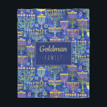 Cobertor De Velo Hanukkah Blue Dourado Menorah Star do nome David<br><div class="desc">Este cobertor de velo personalizado de Chanucá apresenta um padrão chic de ouro,  menorah verde e roxo e estrela dourada de David em um fundo azul com seu nome de família em ouro falso para personalizar. Decorra sua casa em estilo! Projetado pelo artista mundialmente famoso ©Tim Coffey.</div>