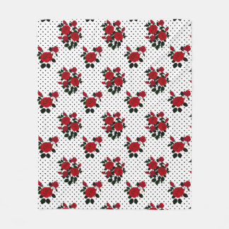 Cobertor De Velo Rosas vermelhas sobre um fundo de bolinhas.
