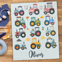 Tratores de bebês bonitos em uma Fazenda