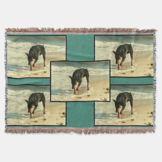 Cobertor Doberman na Imagem de Pintura na Praia
