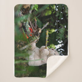 Cobertor Sherpa Beertje dat bij kampvuur zit. sherpa deken