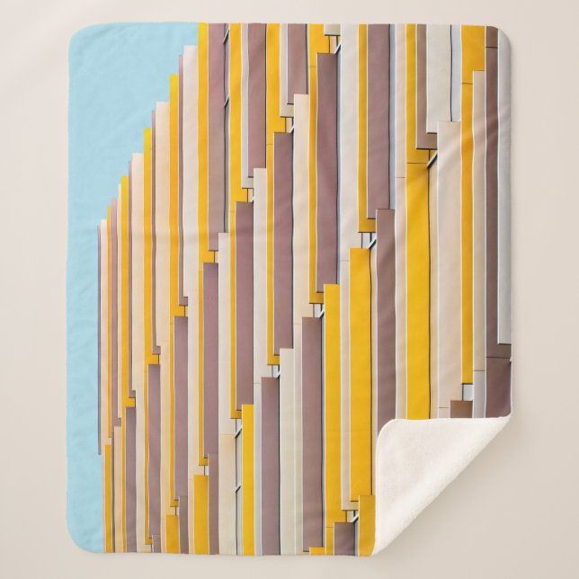 COBERTOR SHERPA CONSTRUÇÃO CONCRETA AMARELO DURANTE O DIA (Frente)