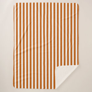 Cobertor Sherpa Laranja queimada e faixas brancas de doces