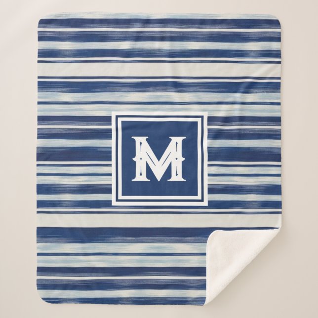 Cobertor Sherpa Monograma com risca azul e branca (Frente)