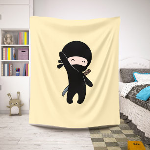 Cobertor Sherpa Ninja feliz pequeno em amarelo