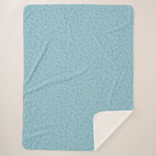 Cobertor Sherpa Pequenas bolinhas em azul claro.