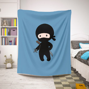 Cobertor Sherpa Tiny Ninja segurando estrela que joga no azul