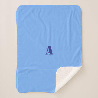 Cobertor Sherpa Um monograma de bordo azul claro
