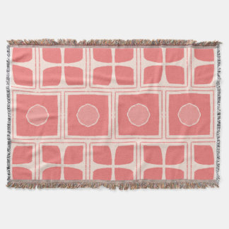Cobertor tons de coral rosa e um creme leve ou esbranquiçad
