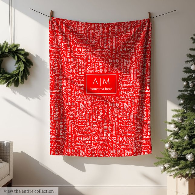cobertor vermelho festivo com letra de Natal (Festive red blanket with Christmas lettering)
