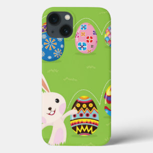 Coelhinho da Páscoa brincalhão com ovos pintados
