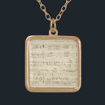 Colar Banhado A Ouro Folha de música em pergaminho manuscrita a tinta<br><div class="desc">Música antiga de folha antiga escrita à mão a tinta preta num pergaminho bege antigo com notas. Memórias de há muito tempo,  quando a música era escrita à mão a tinta. Notações e rabiscos ao lado dão um toque pessoal.</div>