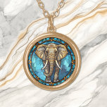 Colar Banhado A Ouro Vidro escondido do mosaico azul-elefante<br><div class="desc">Neste colar único está uma imagem de um elefante marrom-cinza caminhando em direção ao espectador com um fundo de vidro colorido mosaico azul. Uma borda ornamentado acrescenta elegância ao perímetro. Certifique-se de ver os brincos correspondentes e a cadeia chave na nossa loja.</div>