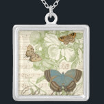 Colar Banhado A Prata Borboletas em Música Folha com Design Floral<br><div class="desc">Um design floral verde e uma partitura musical servem de fundo para um trio de borboletas nesta peça do Vision Studio. A palavra francesa para a borboleta, o papillon, também está gravada no fundo da peça. Se você tem um forte amor por borboletas, natureza, ou como se rodeasse de beleza,...</div>
