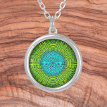 Colar Banhado A Prata Weave Mandala Blue e Green<br><div class="desc">Esta mandala esmerilada apresenta verde e azul em uma manta,  estilo de fio tecido. Imagens psicodélicas para o hippie moderno ou para qualquer pessoa que ame cores ranzinza.</div>