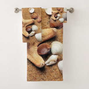 Conjunto De Toalhas Conchas marinhas coloridas na areia