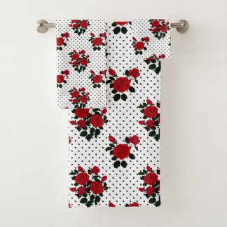 Conjunto De Toalhas Rosas vermelhas sobre um fundo de bolinhas.