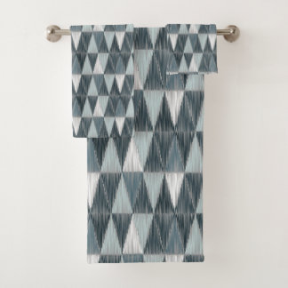 Conjunto De Toalhas Triângulos texturizados cinza e branco.
