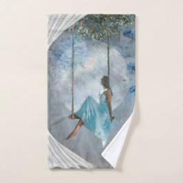 Conjunto De Toalhas Uma mulher com um vestido azul num balanço