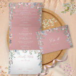 Convite Com Dobra Tripla Dusty Rosa Floral Wildflower Casamento Fotográfico<br><div class="desc">Um elegante convite de casamento triplo em um com sua foto especial, suas iniciais de monograma e uma cascata de flores silvestres folhagem floral que contém seus detalhes de casamento em um fundo de rosa empoeirado. O convite inclui os detalhes das informações de convidado de celebração e um cartão RSVP...</div>