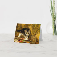 Kitten com pintura e escovas